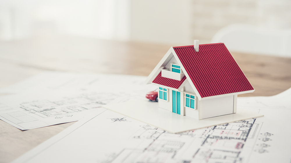 Modellhaus auf einem Tisch | Immobilen Privatverkauf | Eberl Immobilien München